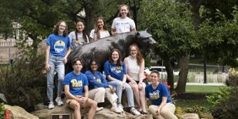 Students pose by the Panther statue