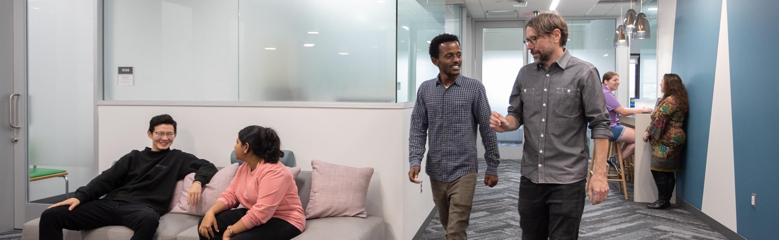 Students gathering in MQE department space